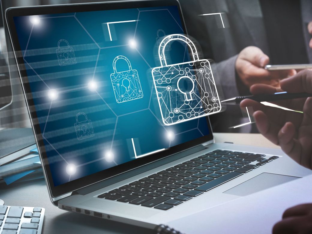 Laptop with a digital padlock graphic representing secure access