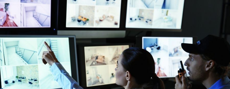 Monitoring agent watching live security camera feeds